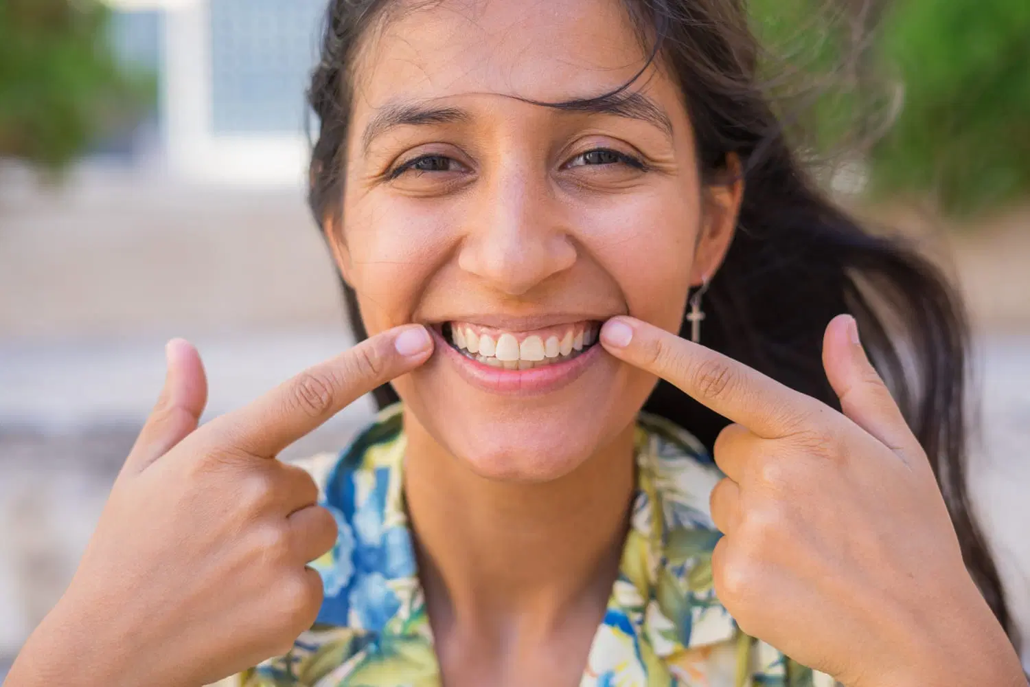 woman showing her teeth