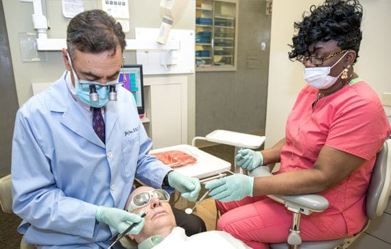 Dr. John with patient