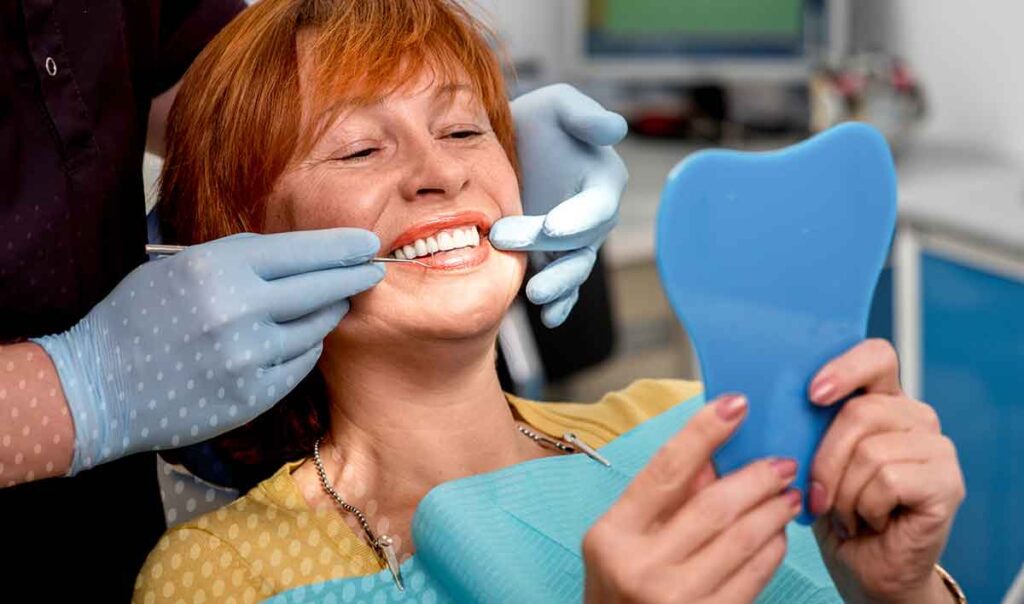 Woman showing her teeth